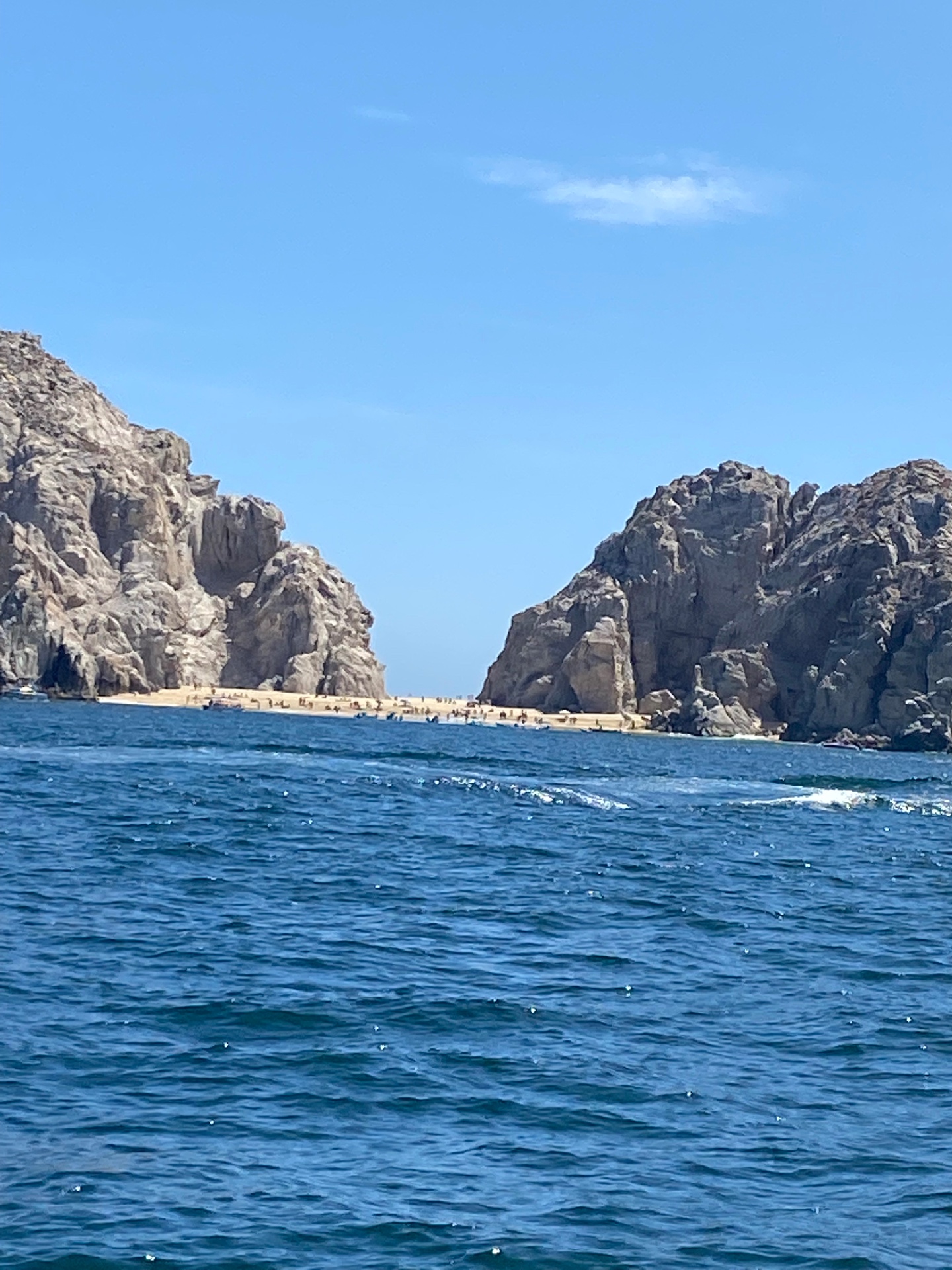Lover's Beach, glimpsed between the cliffs