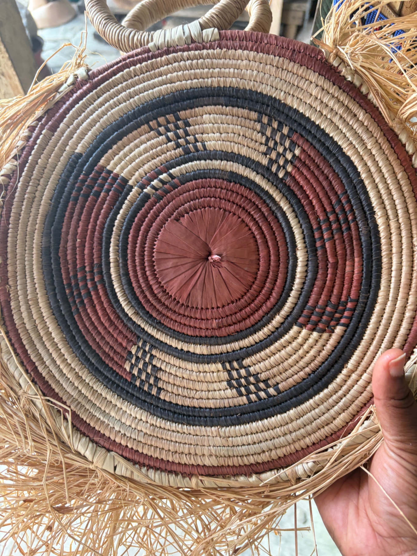 Hand-woven Bolga basket — artisan market