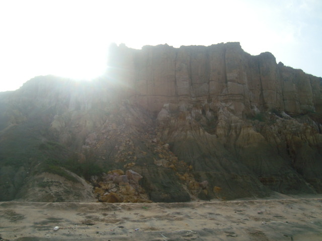 Popenguine — the red cliffs at dusk